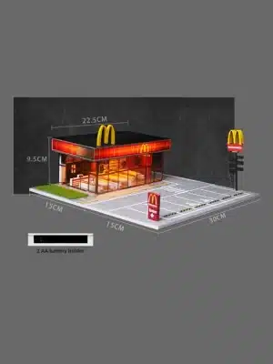 A MoreArt 1/64 McDonald's Diorama Display with LED Lights, showing its dimensions (30x15x9.5cm) and 2x AA battery holder.