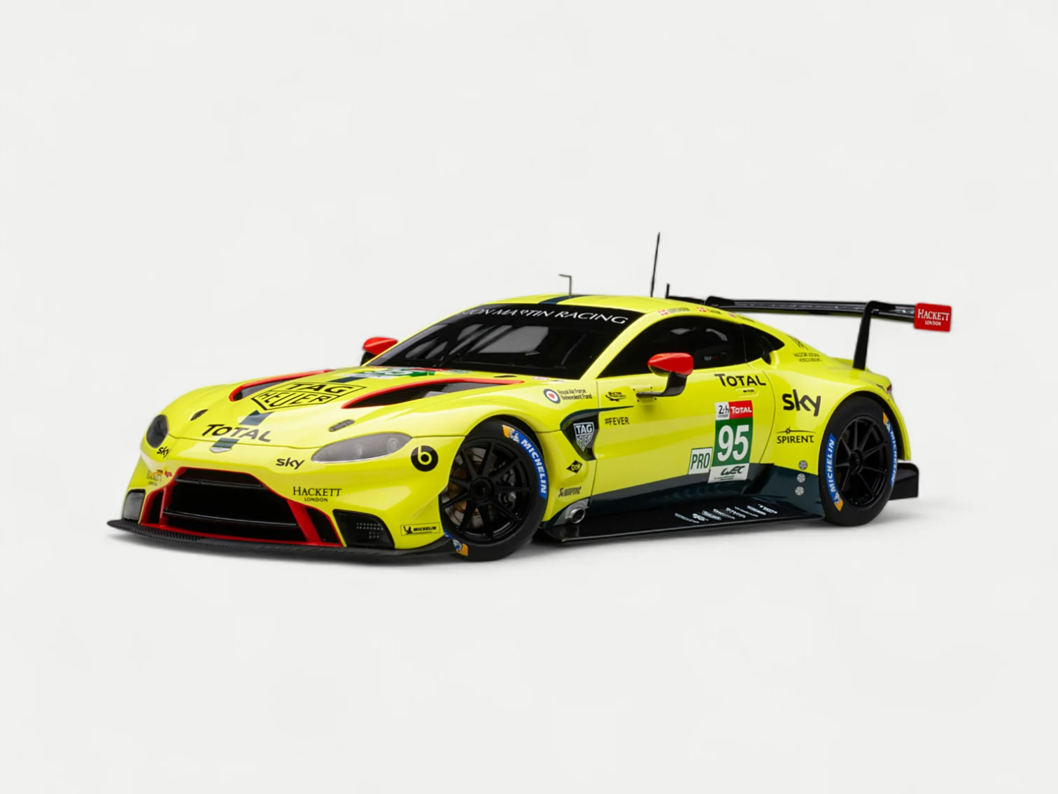 A dynamic front three-quarter view of the AUTOart 1/18 Aston Martin Vantage GTE, the legendary #95 "Dane Train" from the 24 Hours of Le Mans.