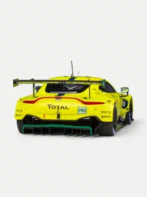 An angled rear view of the 1/18 Vantage GTE Le Mans model, showcasing the intricate details of the full-width rear wing and massive carbon fiber diffuser.