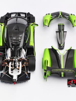 A top-down "blueprint" view of the Pagani diecast for collection, with the body panels laid out next to the fully detailed rolling chassis.