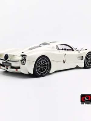 Rear three-quarter view of the 1:18 Pagani Utopia Diecast Model in Pearl White, showcasing its wide muscular haunches and integrated aerodynamics.