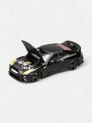 The Nissan GT-R R35 model with opening hood, showcasing the innovative chassis button feature and the detailed VR38DETT engine replica by Motorhelix.