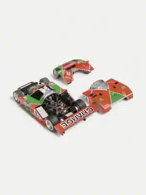 A hero shot of the MOTORHELIX 1/64 Mazda 787B #55, a detailed diecast model of the iconic 1991 Le Mans Winner.