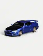 [PRE-ORDER] Motorhelix 1:64 Nissan Skyline GT-R (R34) V-Spec II Customized Bayside Blue w/ Carbon Fiber Bonnet