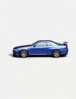[PRE-ORDER] Motorhelix 1:64 Nissan Skyline GT-R (R34) V-Spec II Customized Bayside Blue w/ Carbon Fiber Bonnet