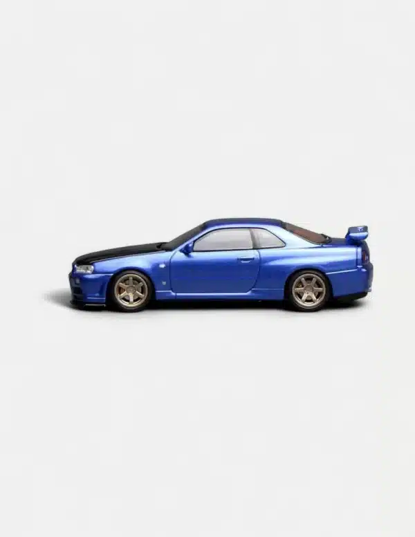 [PRE-ORDER] Motorhelix 1:64 Nissan Skyline GT-R (R34) V-Spec II Customized Bayside Blue w/ Carbon Fiber Bonnet