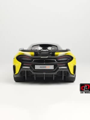 A direct rear view of the 1:18 McLaren 600LT diecast model, showing the iconic top-exit exhausts, carbon fiber diffuser, and "600LT" badge.