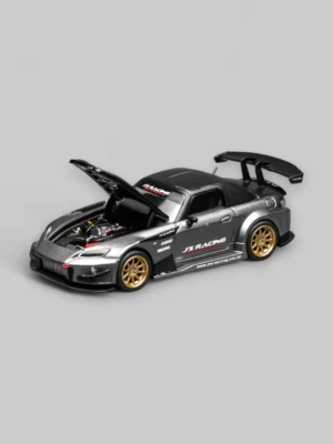The Motorhelix 1:64 J's Racing S2000 in Moon Rock Metallic with its hood open, revealing the highly detailed Honda VTEC engine replica.