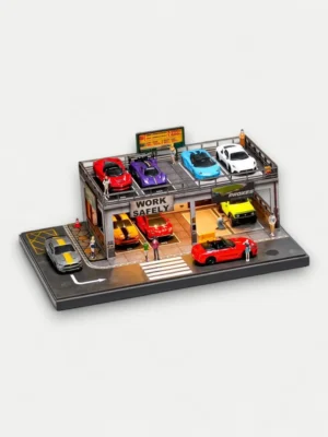 High-angle view of a 1:64 scale diecast model car diorama garage, showing the upper parking deck and lower workshop area full of cars.