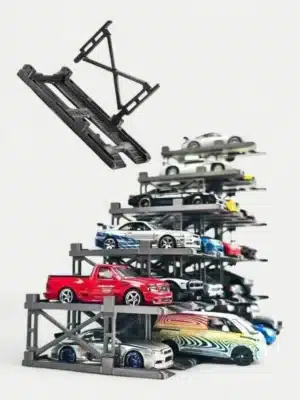 A tall, custom-stacked tower made from the 1:64 scale PITBOX modular parking rack display, demonstrating its unlimited expandability for diecast cars.