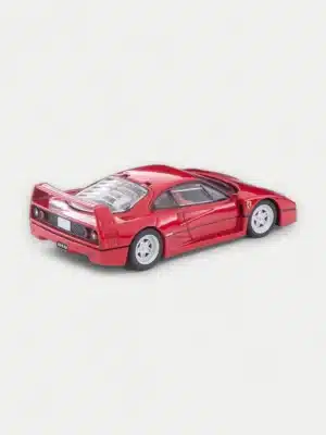 A rear 3/4 view of the 1:64 TLV-N F40 diecast model, highlighting its iconic integrated rear wing and louvered engine cover.