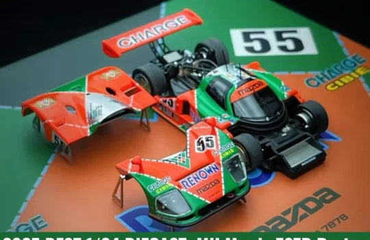Motorhelix (MH) 1:64 Mazda 787B #55 Renown diecast model with magnetic cowls removed showing R26B rotary engine detail for 2025 best model review.