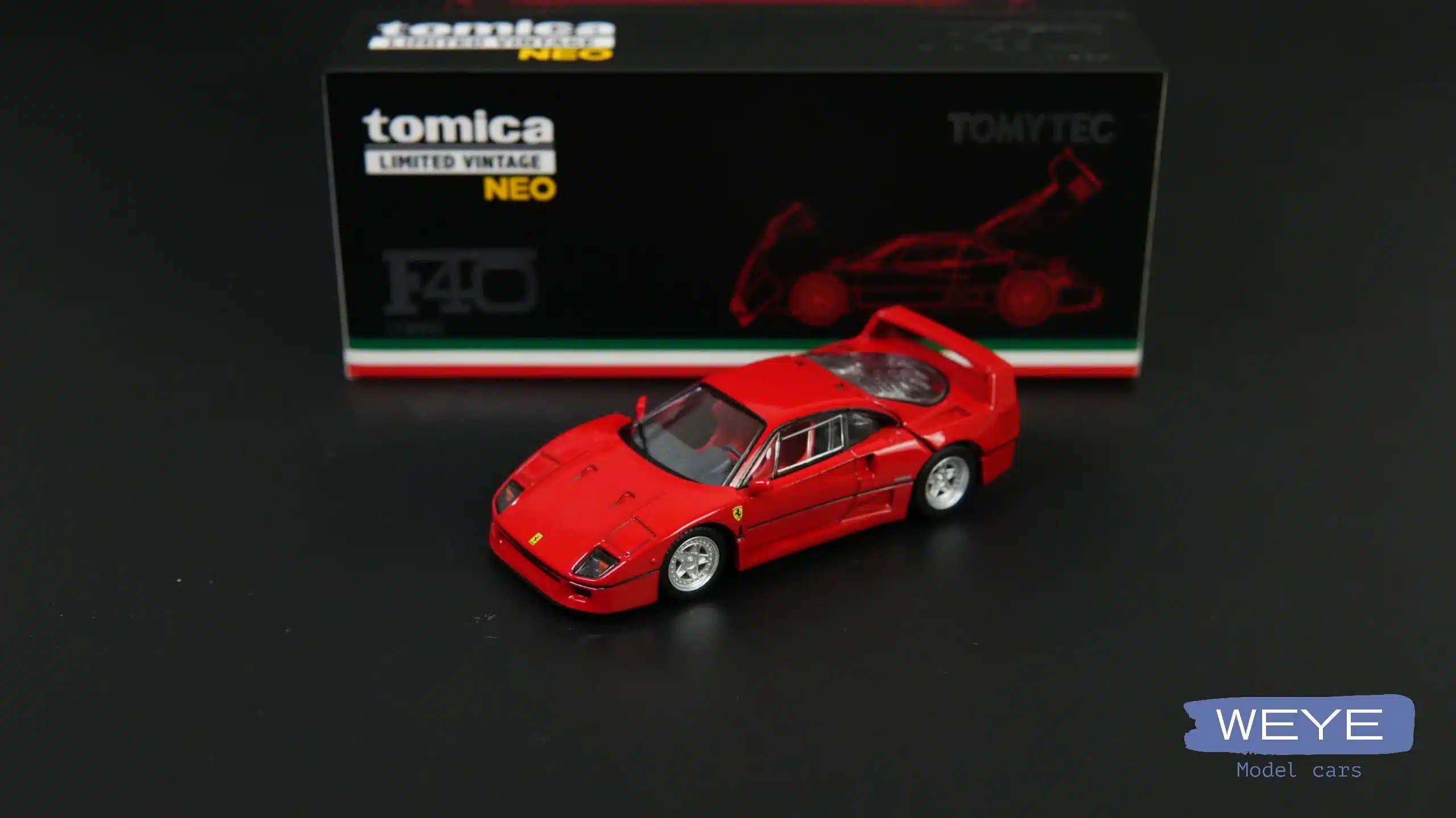High-angle studio shot of the 2025 Tomytec Ferrari F40 showing its perfect body stance and high-clarity windshield glass.