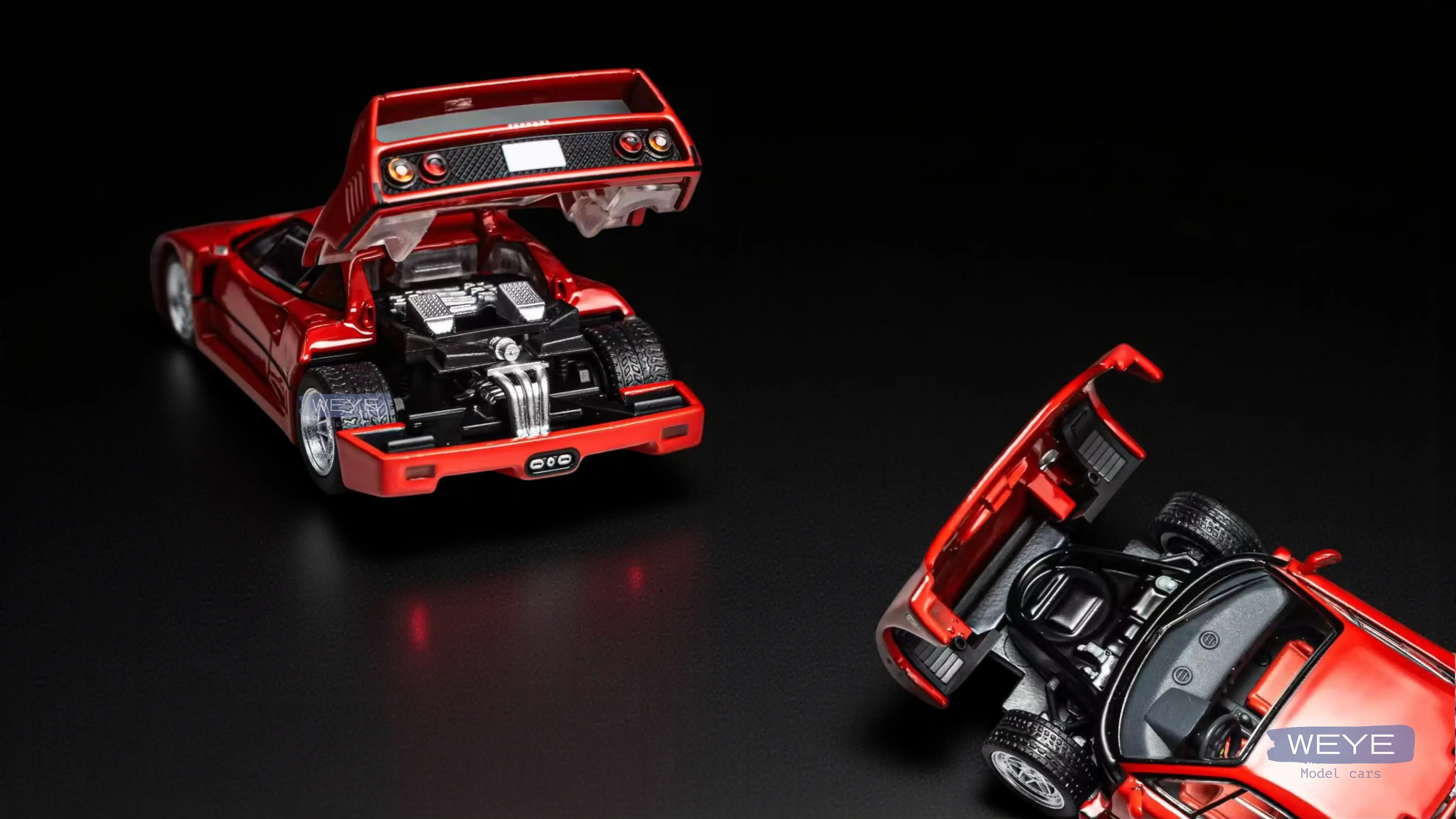 Studio shot of 2025 Tomytec Ferrari F40 1/64 model with rear engine cover and front hood fully open to show internal details.
