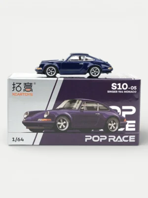 Side profile of Porsche Singer 964 diecast model on S10-05 box, showing Monaco Blue body and Fuchs wheels.