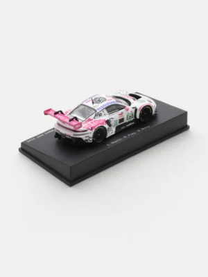 Rear angle of the Iron Dames diecast 1/64 highlighting the massive pink rear wing and aerodynamic diffuser.