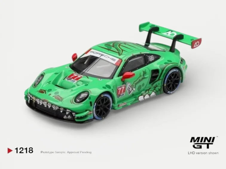 Front view of MINI GT 1218 Porsche 911 GT3 R featuring the unique gold tooth Rexy livery from 2025 Sebring.