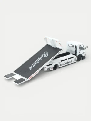 Rear angle of the 1/64 Mitsubishi Fuso Flatbed Transporter showing the fully functional tilting 1:64 scale car carrier bed.