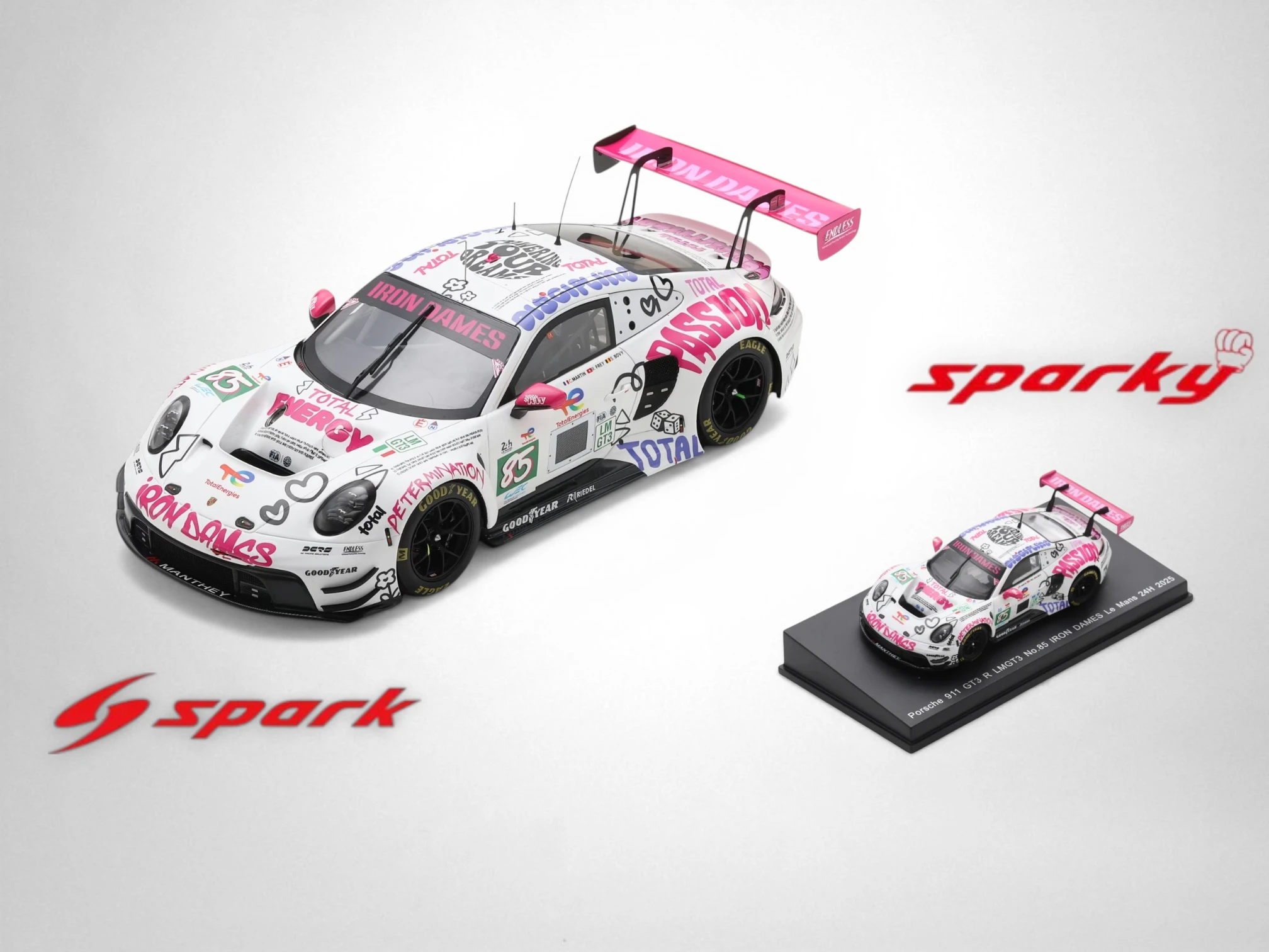 Side-by-side comparison of a Spark 1/18 resin Porsche 911 GT3 R Iron Dames and its Sparky 1/64 diecast counterpart