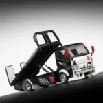 Mega Gear 1:64 Custom Flatbed Tow Truck - Dinosaur Racing Liveries (Green / Pink / Black)
