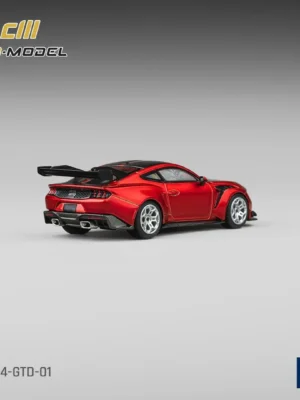 Rear view of the 1/64 Ford Mustang GTD model car by CM Model, highlighting the massive rear wing and diffuser details.