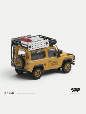 Rear angle of the 1/64 Team Brazil expedition diecast, highlighting the loaded roof rack, sandboards, and rear ladder.