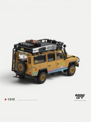 Rear angle of the 1/64 CT.36 Romania Defender diecast, highlighting the winter roof cargo, skis, and rear ladder.
