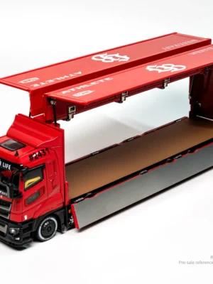 Open gull-wing doors on the 1/64 scale diecast car carrier, revealing the cargo bay of the GCD LBWK Fuso transporter.