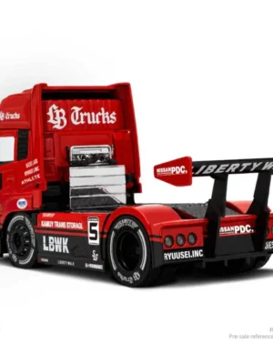 Rear angle of the GCD UD Quon Super Silhouette red truck, featuring the massive Liberty Walk GT wing on this 1:64 model.