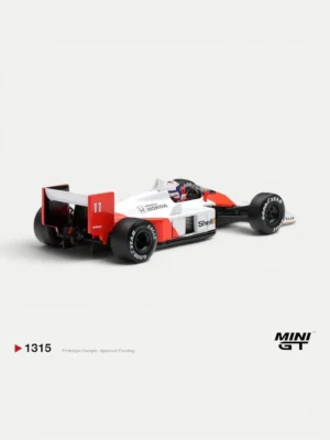 Rear angle of the 1/64 scale Alain Prost #11 McLaren model showcasing accurate F1 aerodynamics and Goodyear tires.