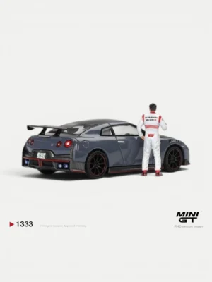 Rear angle of the 1:64 Nissan GT-R Nismo Tsukuba Lap Record edition, highlighting the iconic taillights and diffuser.