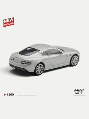 Rear angle of the MINI GT 1360 Aston Martin DBS diecast, showcasing the clear taillights and detailed rear diffuser.