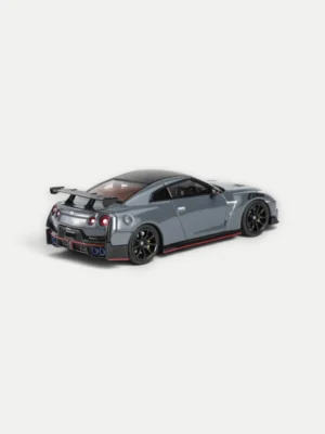 Rear view of the Motorhelix 1/64 R35 GT-R NISMO highlighting the iconic quad taillights and detailed rear diffuser.