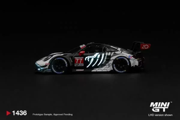 MINI GT #1436 1:64 Porsche 911 GT3 R (992) #77 AO Racing "Skeleton Rexy" 2026 IMSA Petit Le Mans (Glow-in-the-Dark / Glow Rexy)