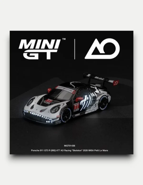 MINI GT #1436 1:64 Porsche 911 GT3 R (992) #77 AO Racing "Skeleton Rexy" 2026 IMSA Petit Le Mans (Glow-in-the-Dark / Glow Rexy)